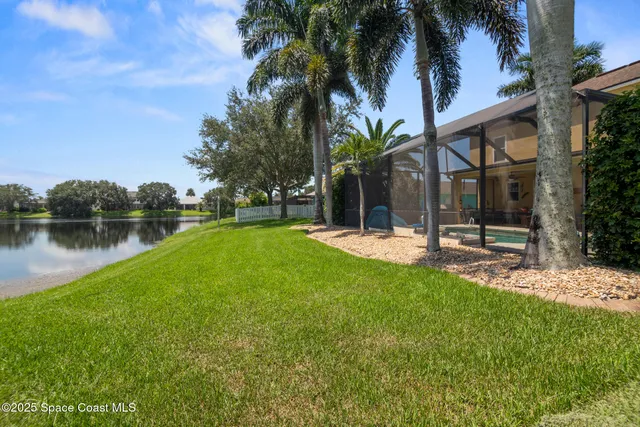 a view of a lake with a big yard