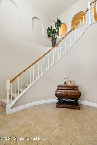 a view of entryway with a front door