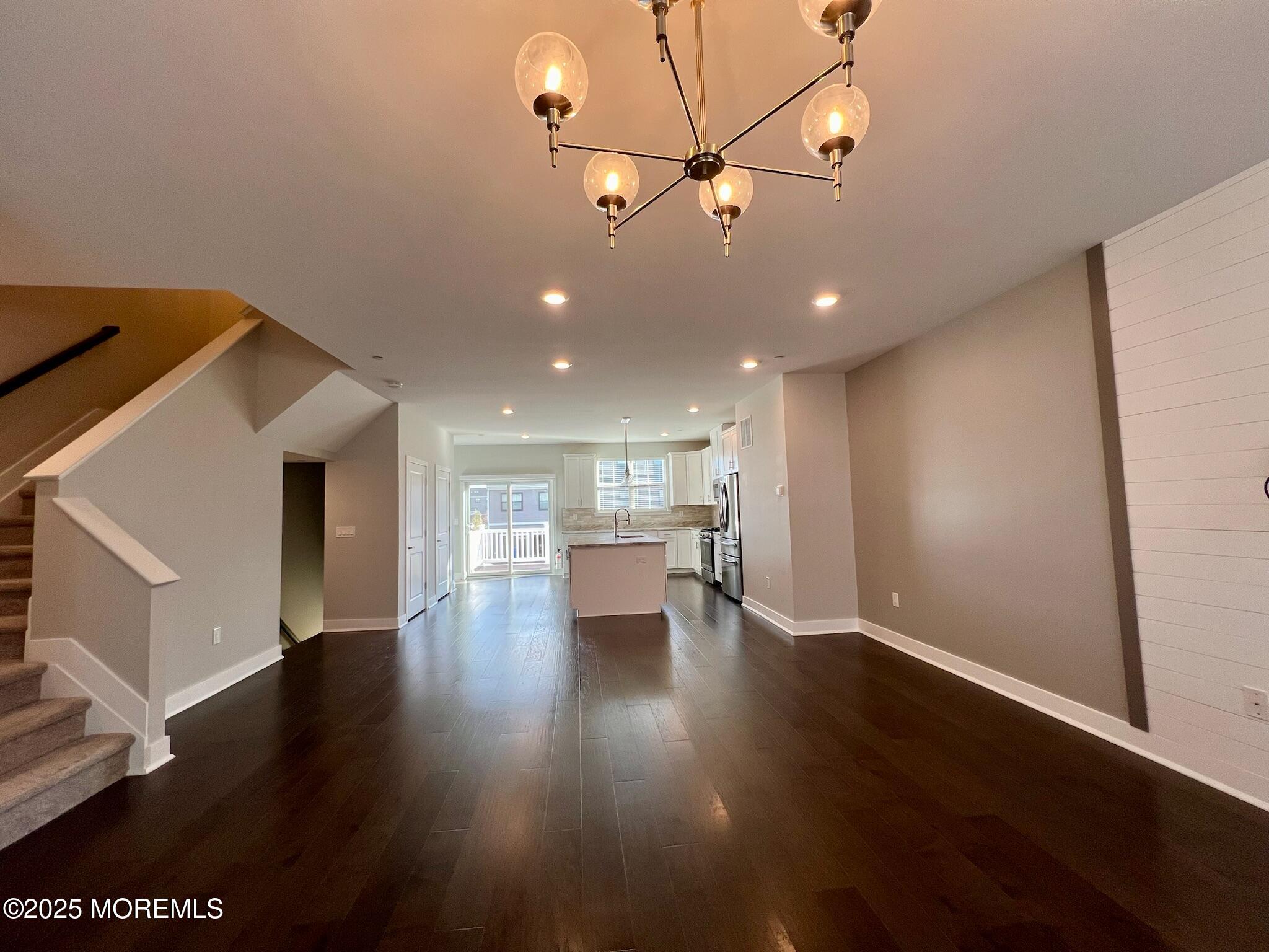 32 Mariveles Way Tinton Falls, NJ 07724 - Photo 11 of 28 a view of empty room with wooden floor