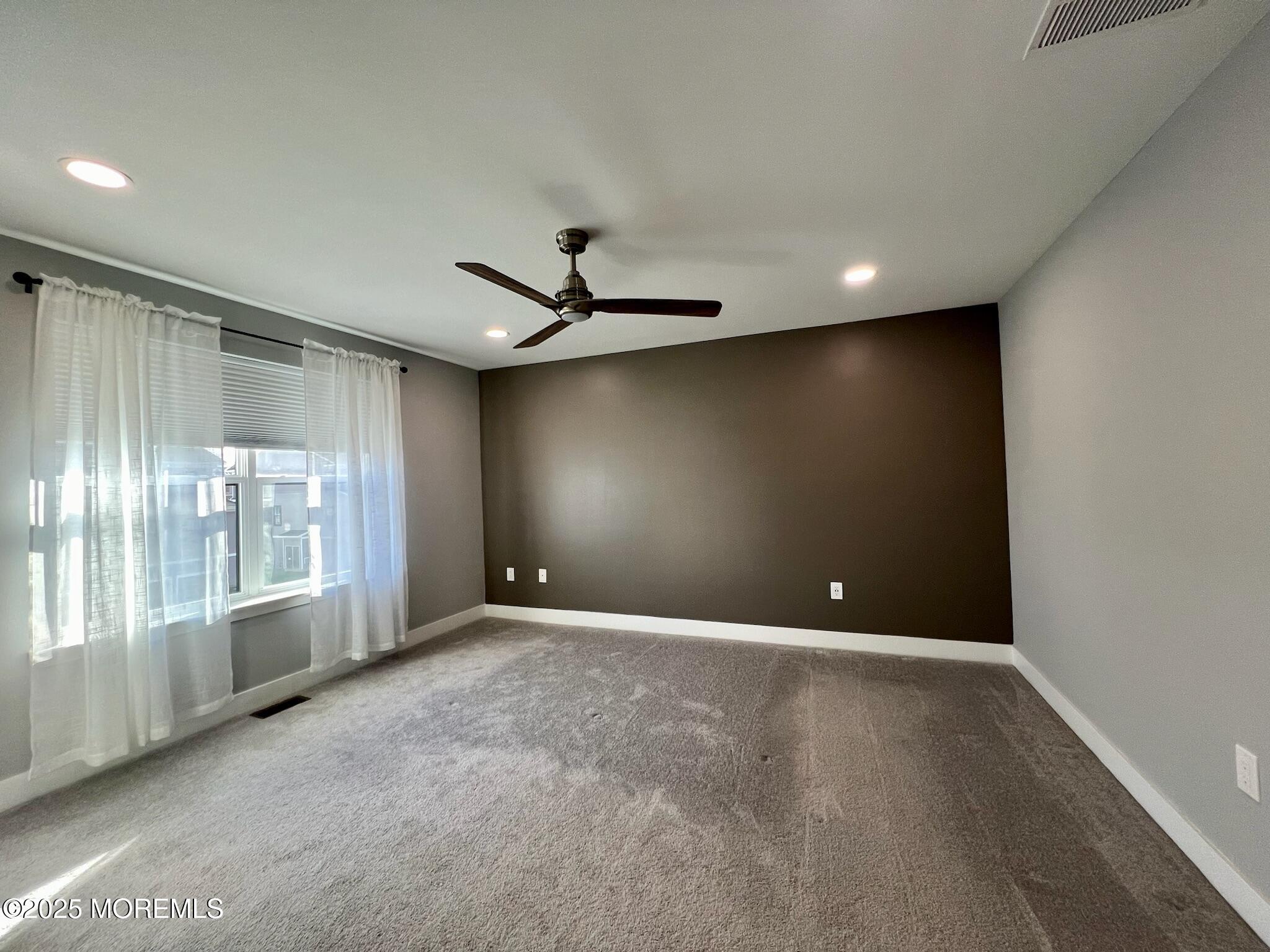 32 Mariveles Way Tinton Falls, NJ 07724 - Photo 20 of 28 a view of an empty room with a window