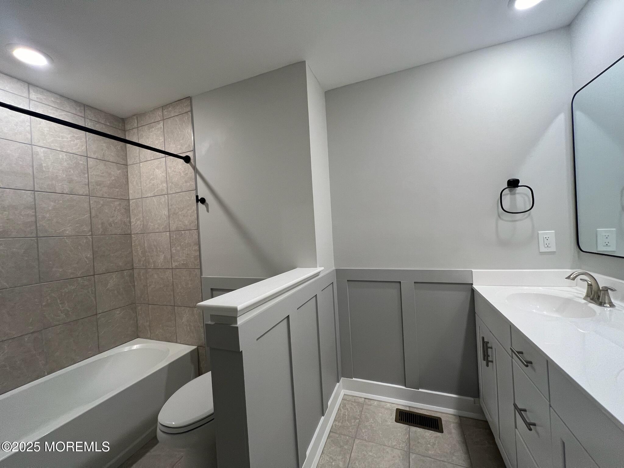 32 Mariveles Way Tinton Falls, NJ 07724 - Photo 21 of 28 a bathroom with a sink a toilet and shower