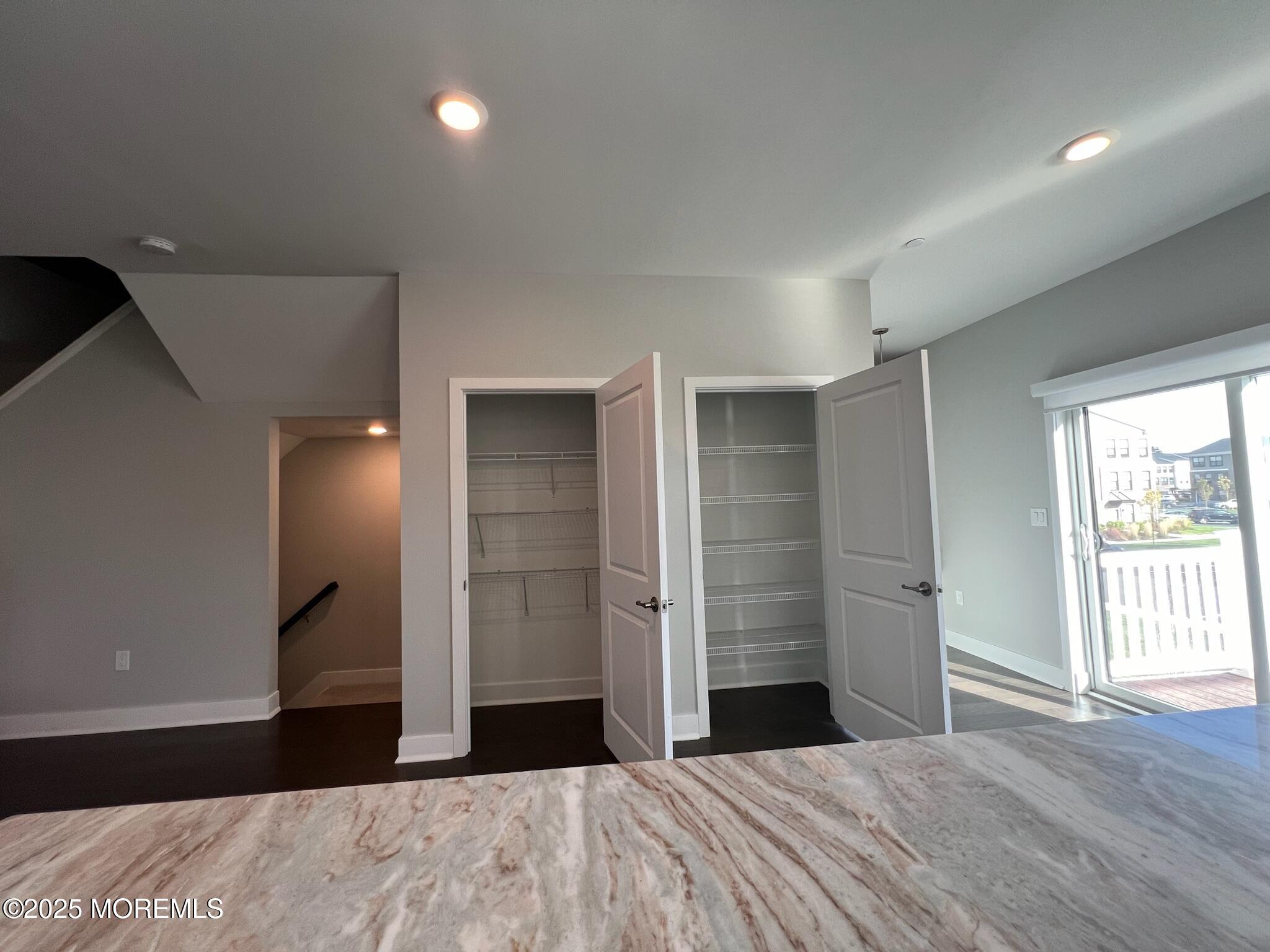 32 Mariveles Way Tinton Falls, NJ 07724 - Photo 7 of 28 a bedroom with a bed and a walk in closet