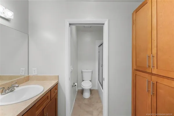 a bathroom with a sink and a toilet