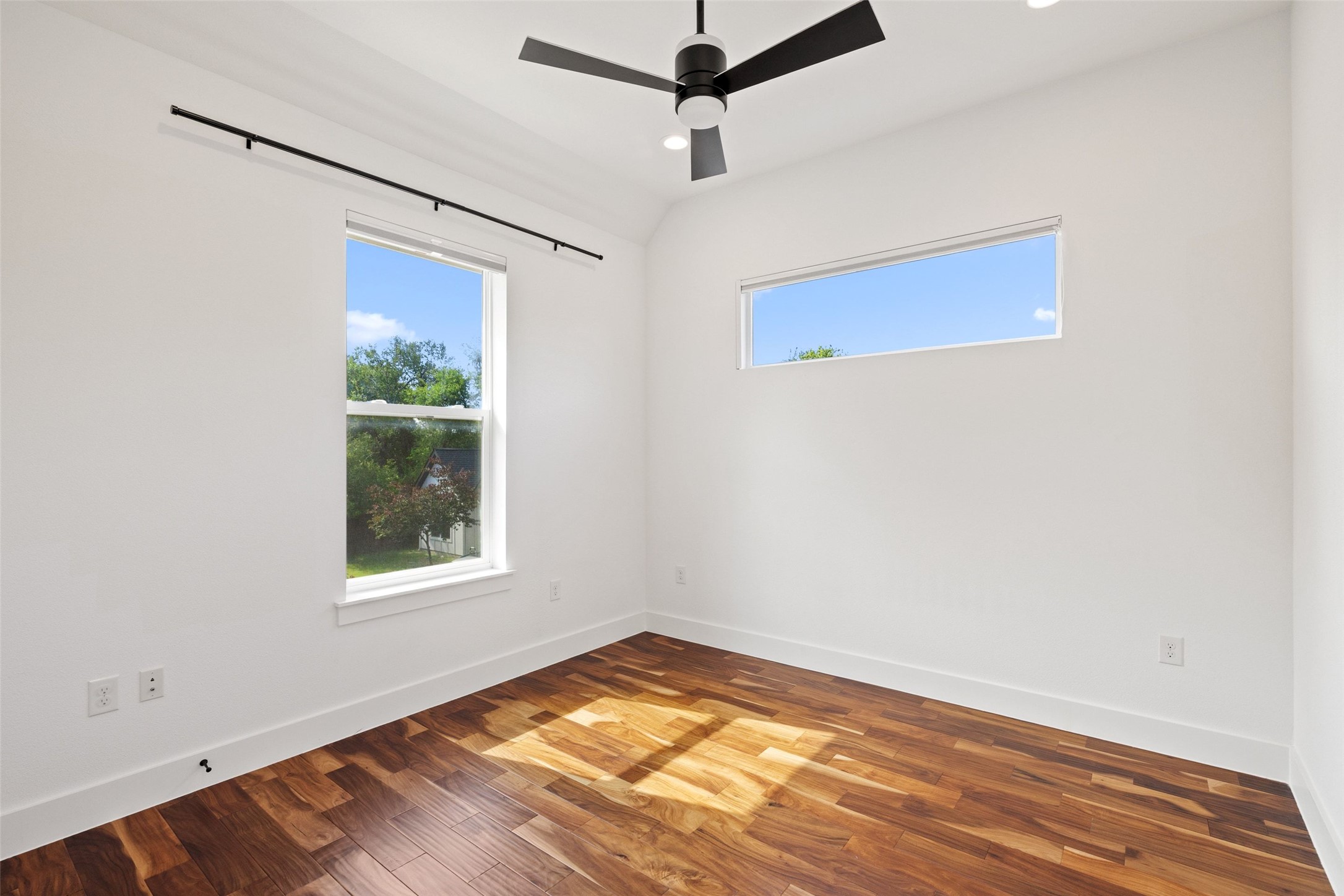 5601 Jackie Robinson Street, Unit 1 Austin, TX 78721 - Photo 28 of 40 Upstairs, a custom stair runner leads to two spacious secondary bedrooms.
