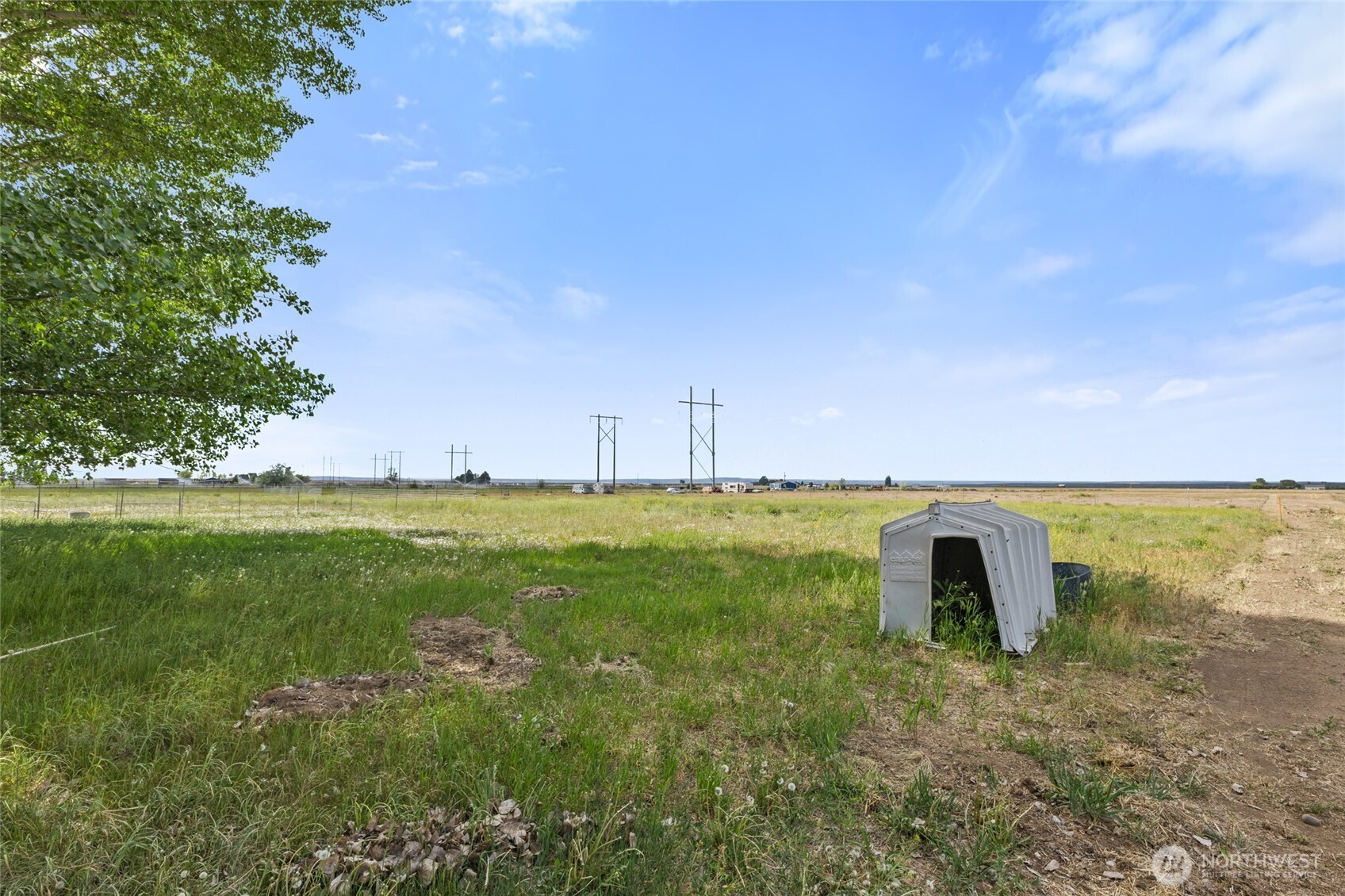 10575 H 8 Moses Lake, WA 98837 - Photo 3 of 9 a view of a garden with a building