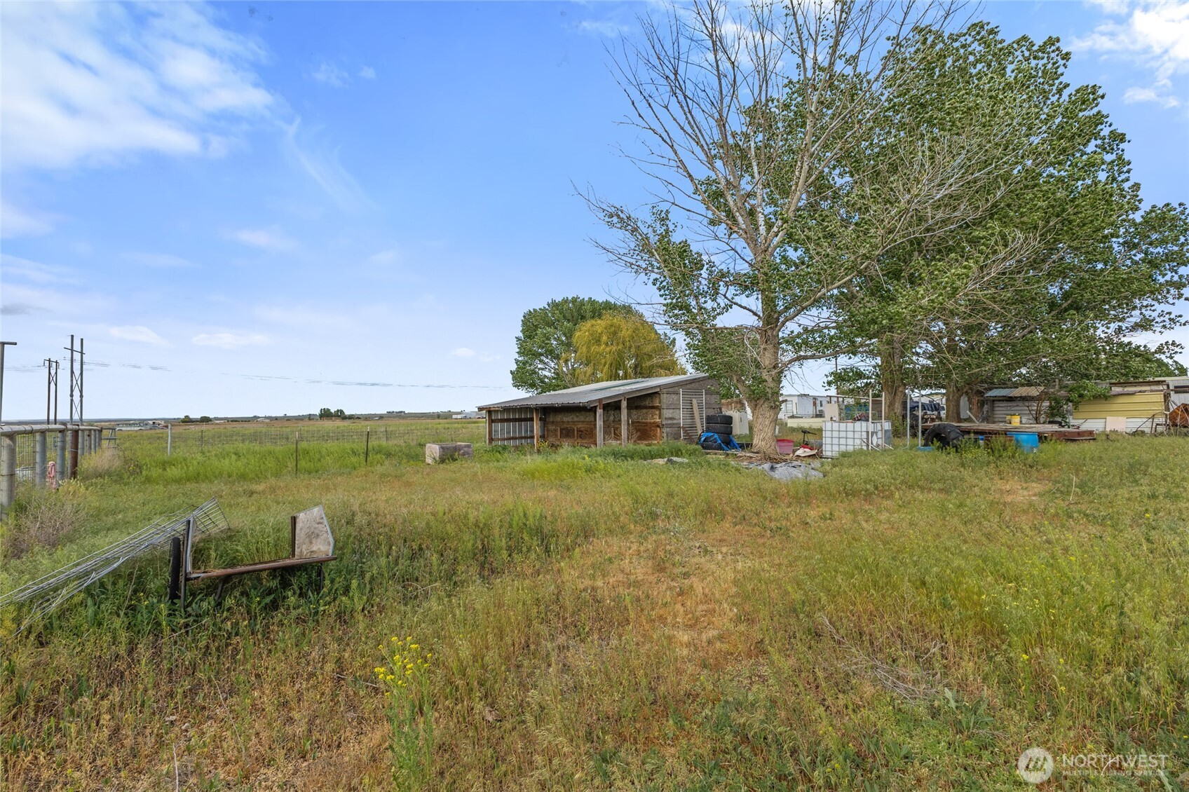 10575 H 8 Moses Lake, WA 98837 - Photo 5 of 9 a view of a lake with a garden