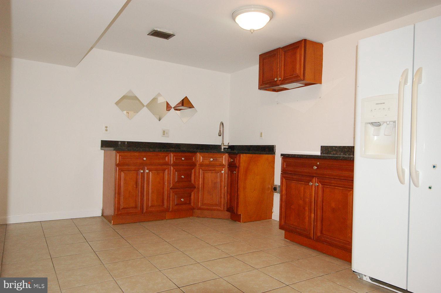 10517 Gorman Road Laurel, MD 20723 - Photo 30 of 46 Basement bar/kitchenette