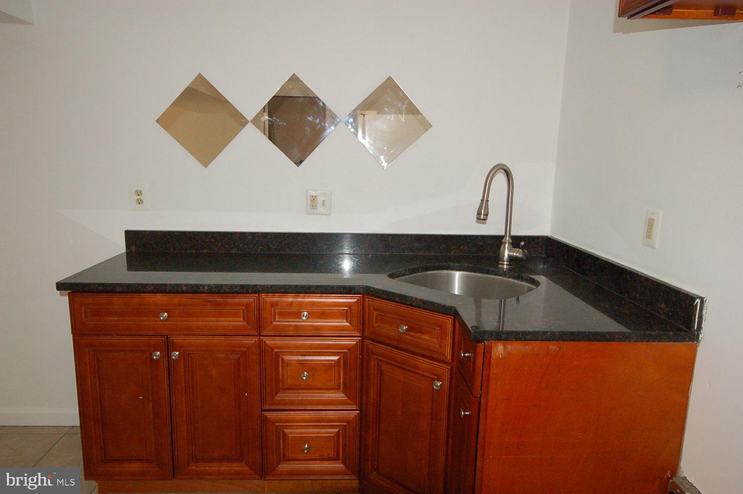 10517 Gorman Road Laurel, MD 20723 - Photo 32 of 46 Basement bar/kitchenette