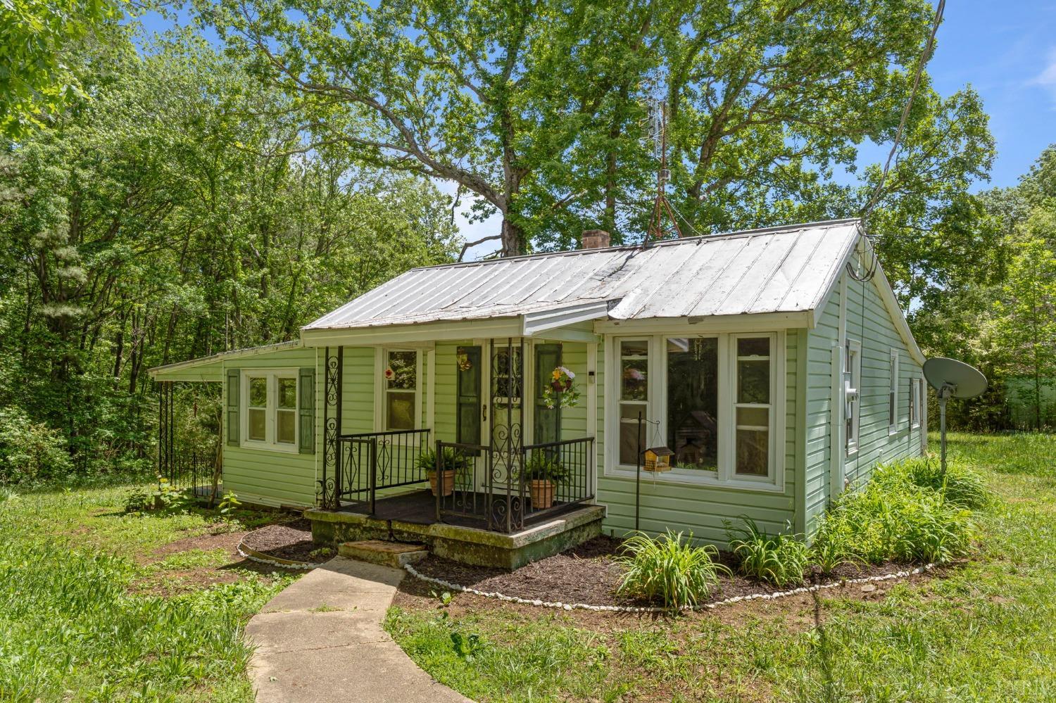 a view of a house with a garden