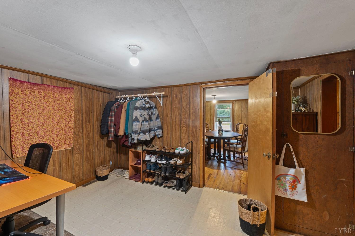 211 Shumaker Road Buckingham, VA 23921 - Photo 16 of 39 a bed room with furniture and a window