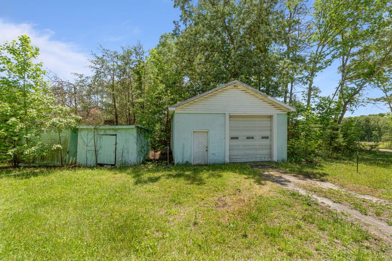 211 Shumaker Road Buckingham, VA 23921 - Photo 38 of 39 a big house with a big yard and large trees