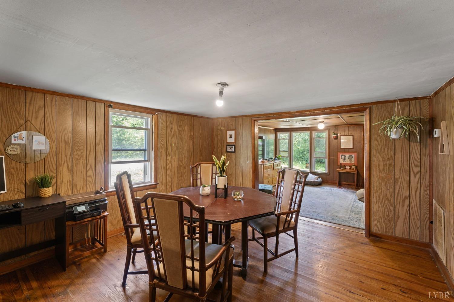 211 Shumaker Road Buckingham, VA 23921 - Photo 7 of 39 a view of a dining room with furniture window and outside view
