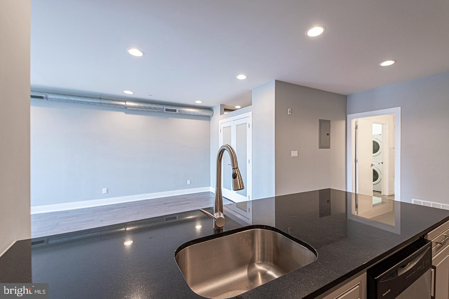 135 North 3rd Street, Unit 3D Philadelphia, PA 19106 - Photo 4 of 20 a bathroom with a sink and a mirror