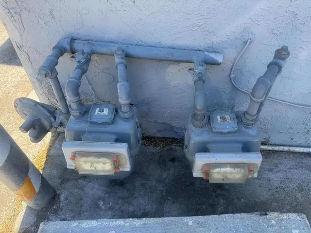 a view of small space in front of house