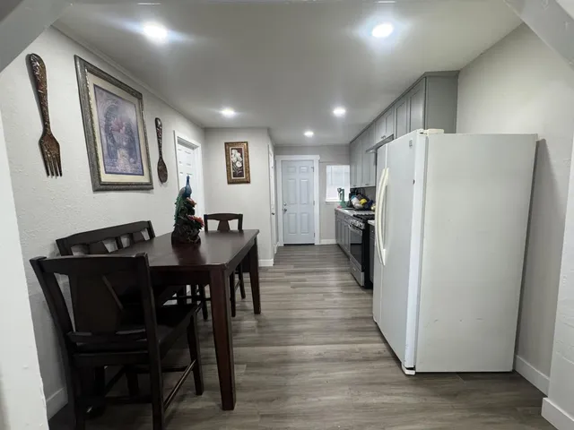 a view of a dining room with furniture