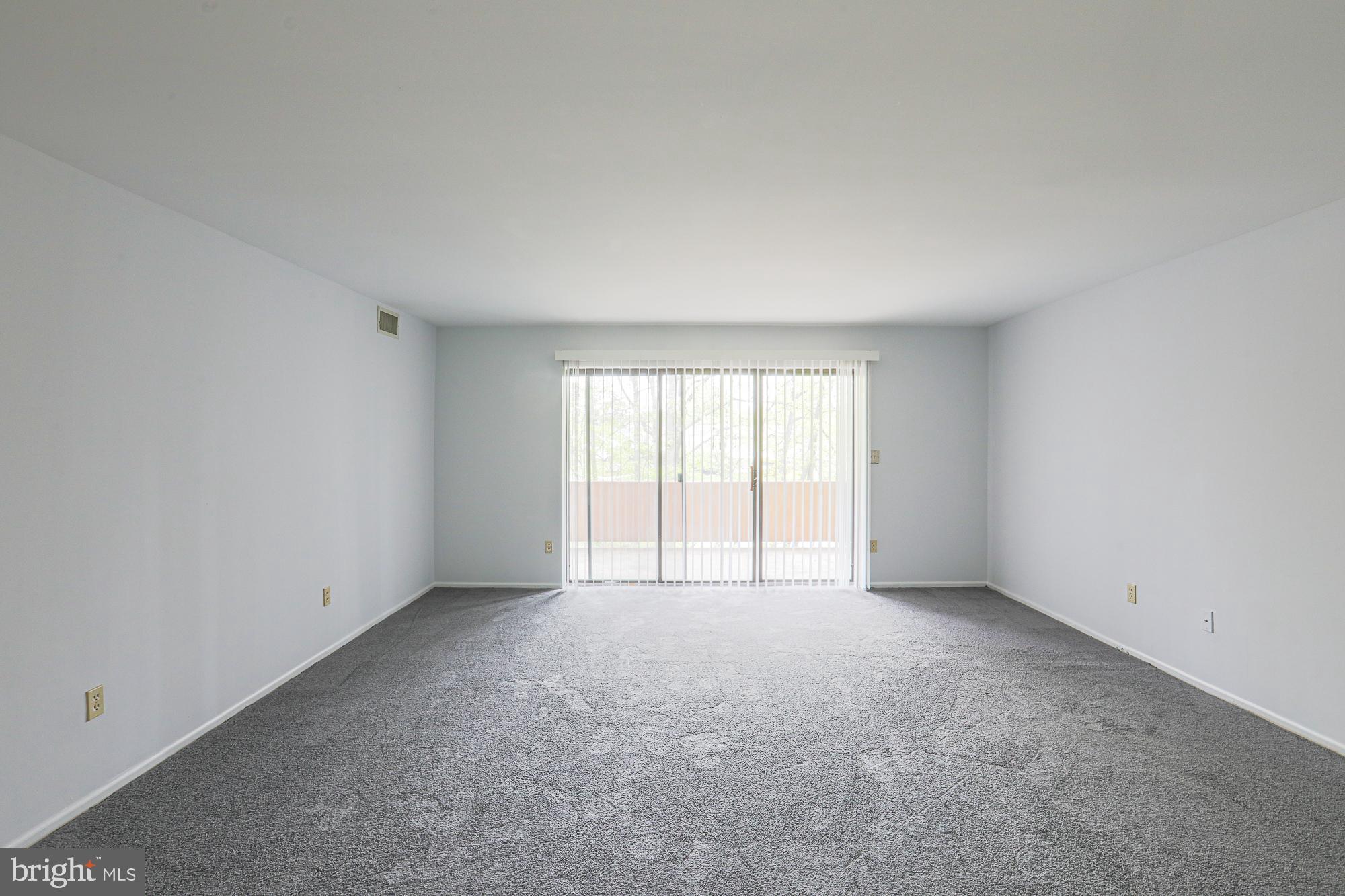 2901 Fallstaff Road, Unit 302 Baltimore, MD 21209 - Photo 8 of 35 Living - Dining Room