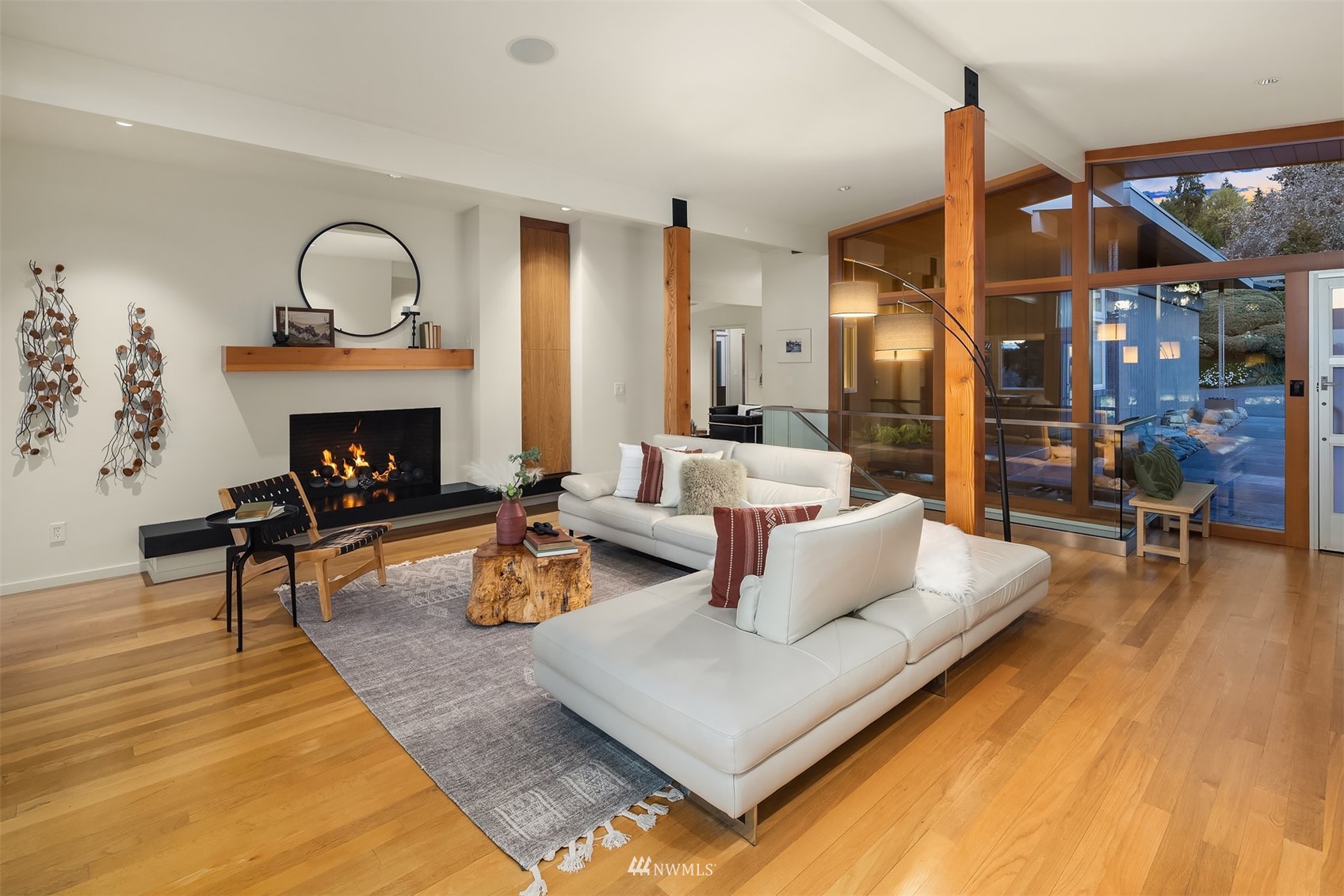 7255 West Ridge Road Mercer Island, WA 98040 - Photo 13 of 40 a living room with furniture and a fireplace