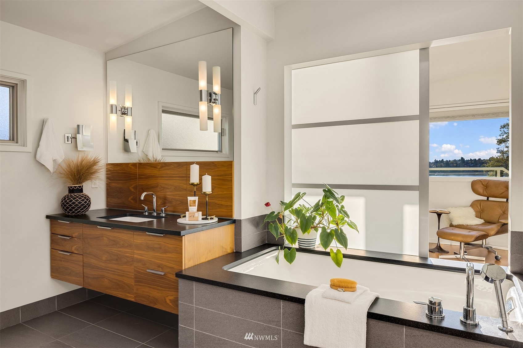 7255 West Ridge Road Mercer Island, WA 98040 - Photo 17 of 40 a bathroom with a sink and a mirror