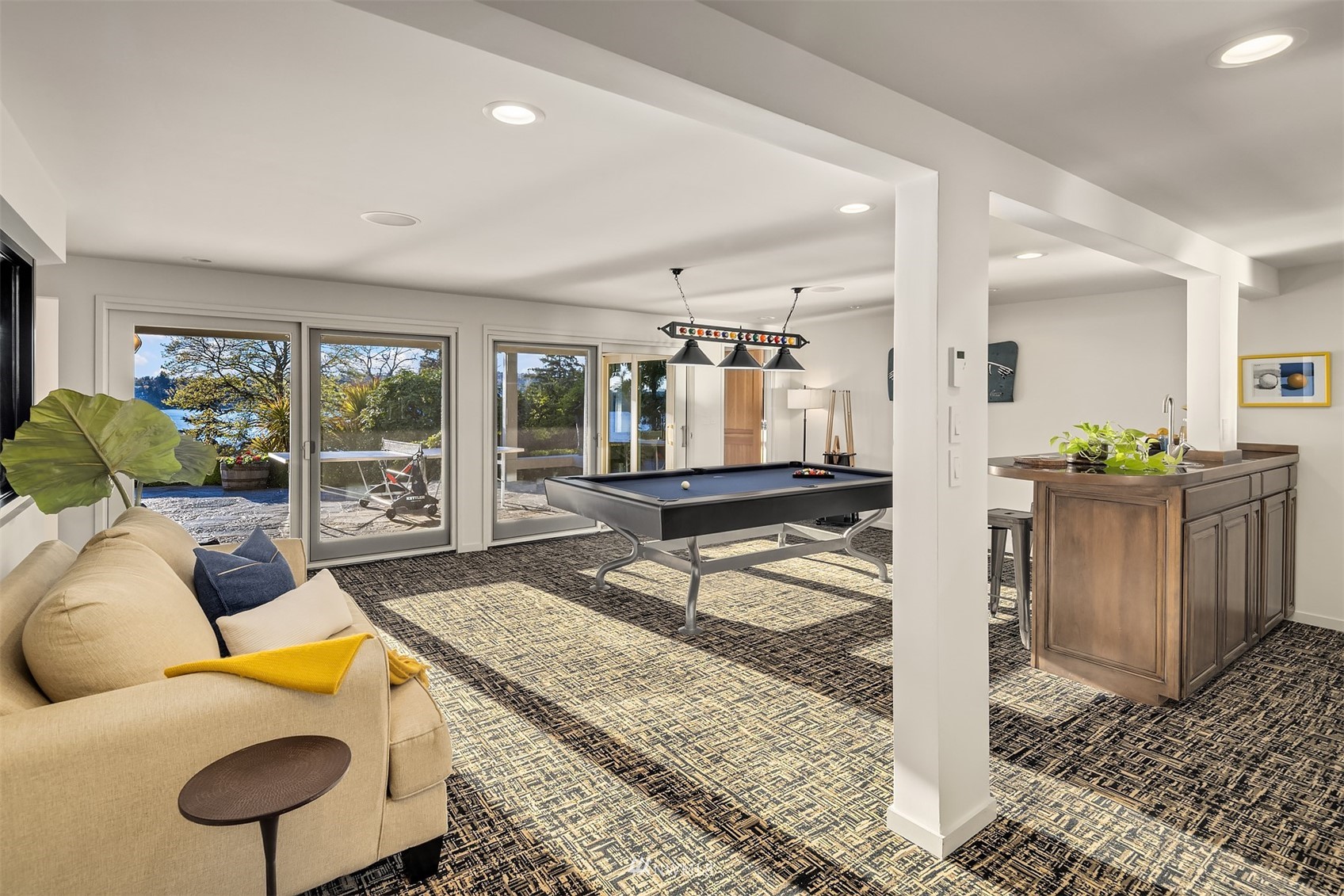7255 West Ridge Road Mercer Island, WA 98040 - Photo 24 of 40 a living room with furniture and a table