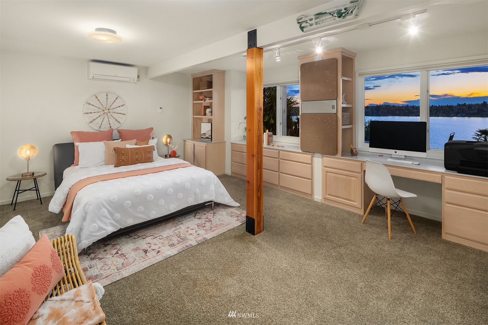 7255 West Ridge Road Mercer Island, WA 98040 - Photo 29 of 40 a bedroom with a bed and furniture