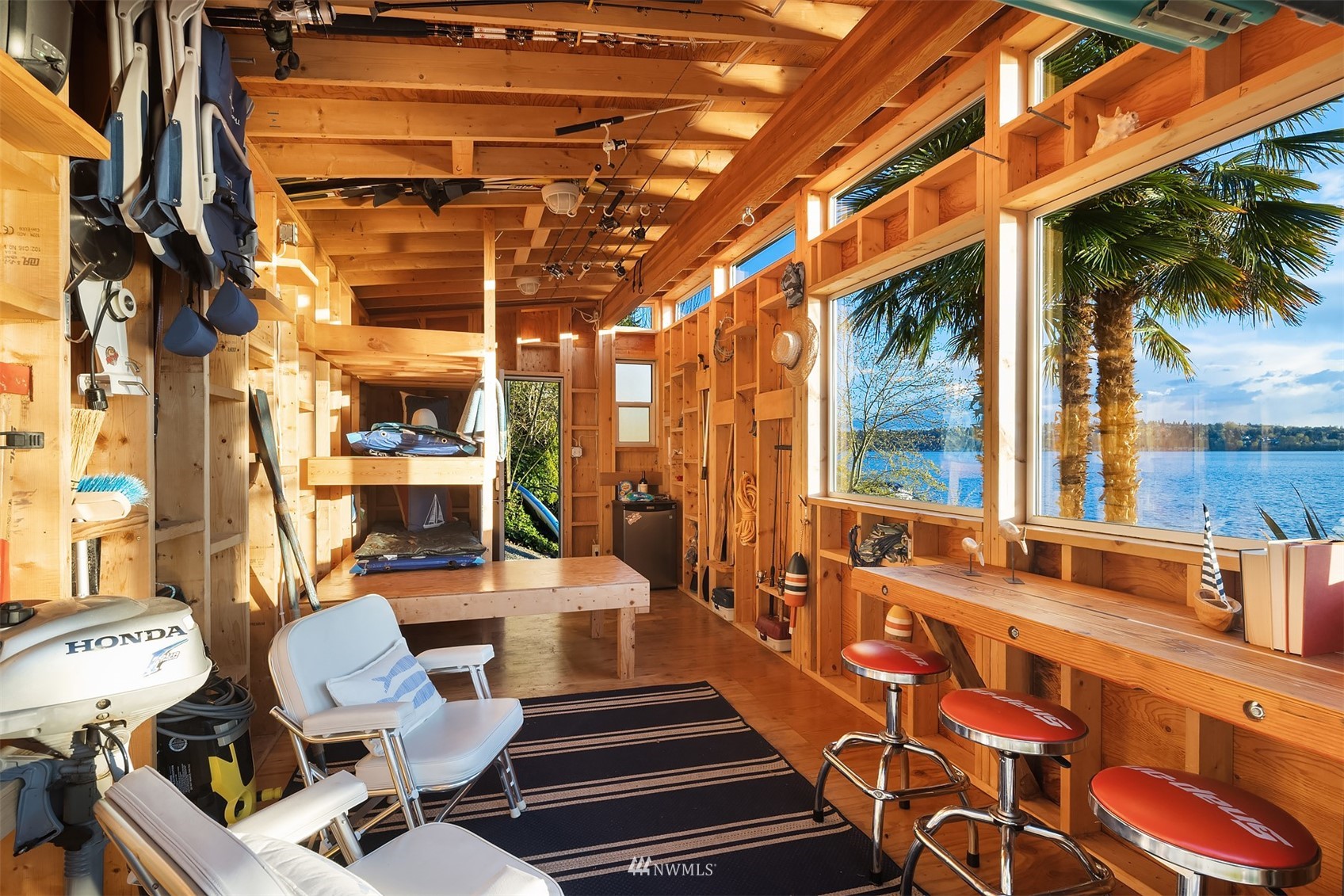 7255 West Ridge Road Mercer Island, WA 98040 - Photo 34 of 40 a view of a patio with couches table and chairs and potted plants