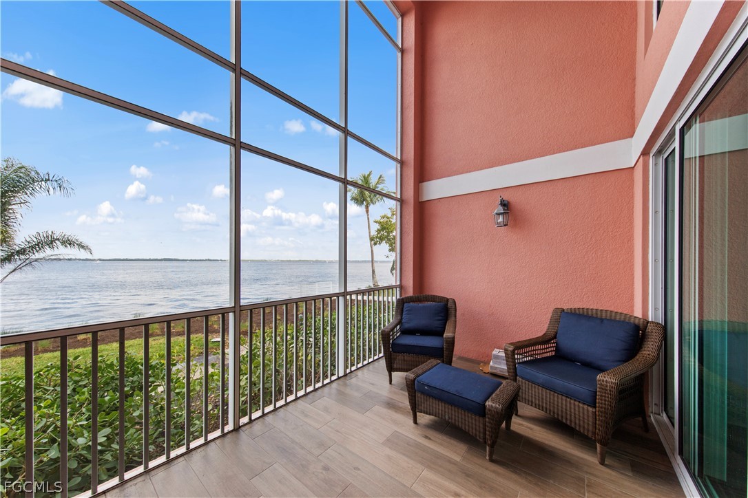 2745 First Street, Unit 113 Fort Myers, FL 33916 - Photo 1 of 35 a balcony with furniture