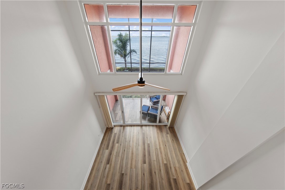 2745 First Street, Unit 113 Fort Myers, FL 33916 - Photo 17 of 35 a view of wooden floor in a room