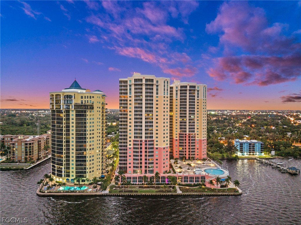 2745 First Street, Unit 113 Fort Myers, FL 33916 - Photo 26 of 35 a front view of a building with glass windows