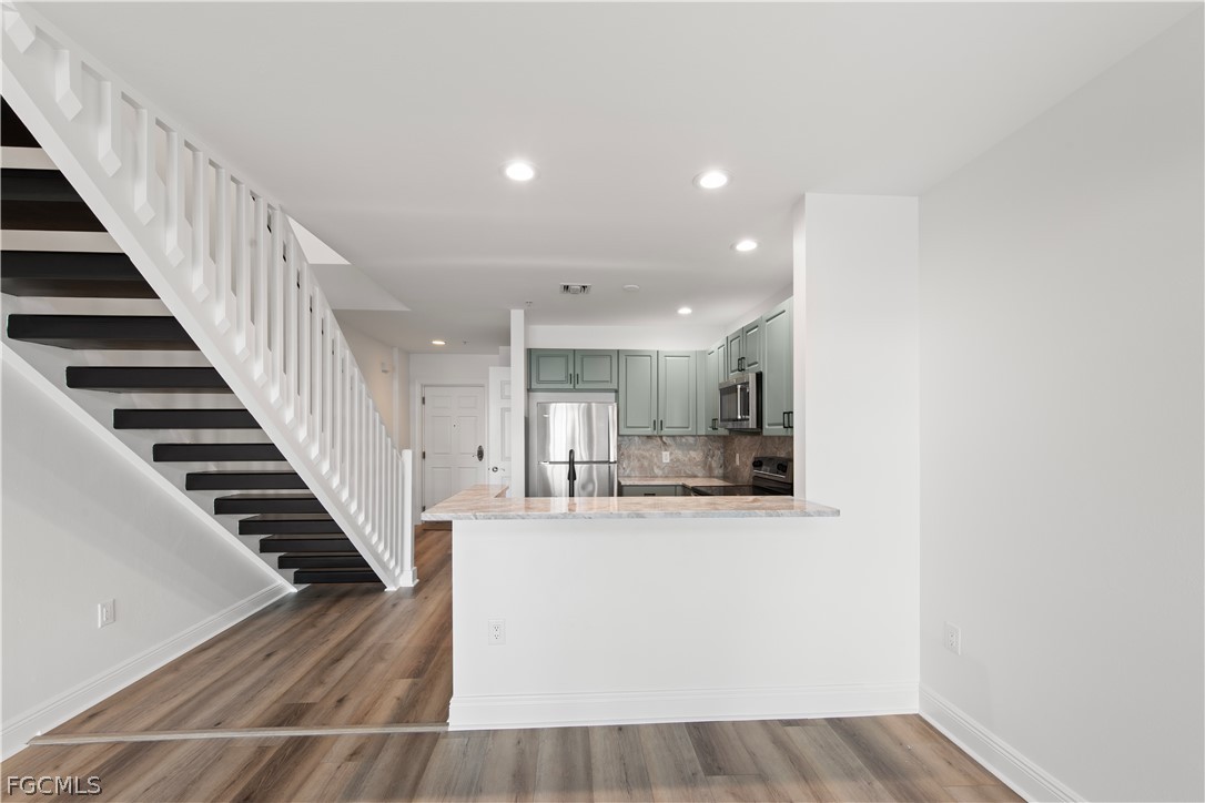 2745 First Street, Unit 113 Fort Myers, FL 33916 - Photo 8 of 35 a view of kitchen with sink and microwave