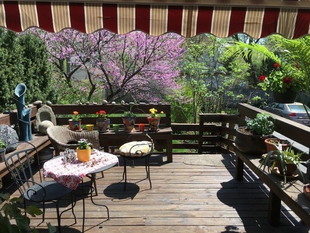 141 Barrypoint Road Riverside, IL 60546 - Photo 16 of 19 a backyard of a house with barbeque oven and outdoor seating