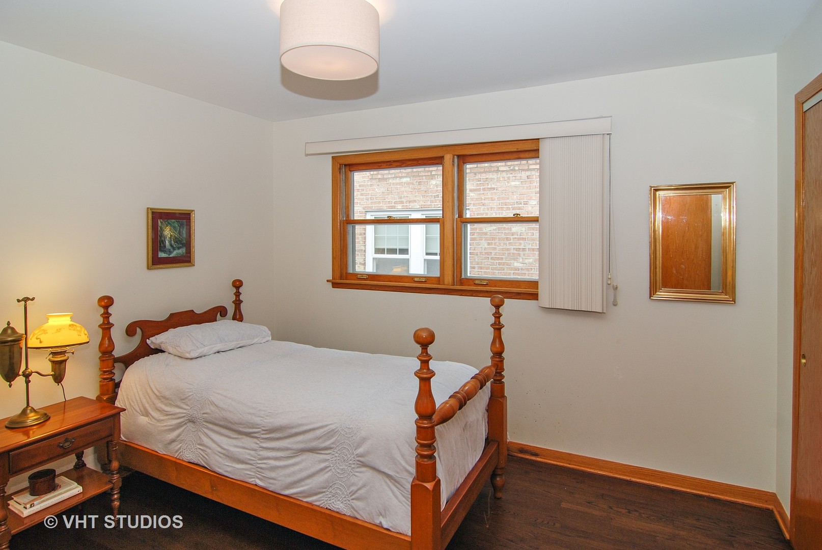 141 Barrypoint Road Riverside, IL 60546 - Photo 7 of 19 a bed room with a bed and a window