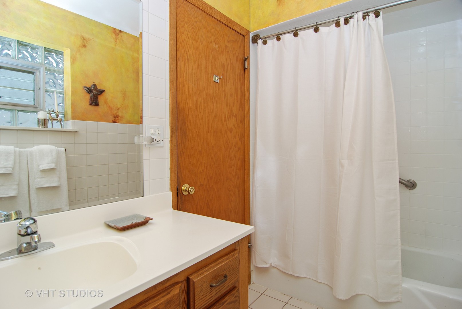 141 Barrypoint Road Riverside, IL 60546 - Photo 9 of 19 a bathroom with a granite countertop sink and a mirror