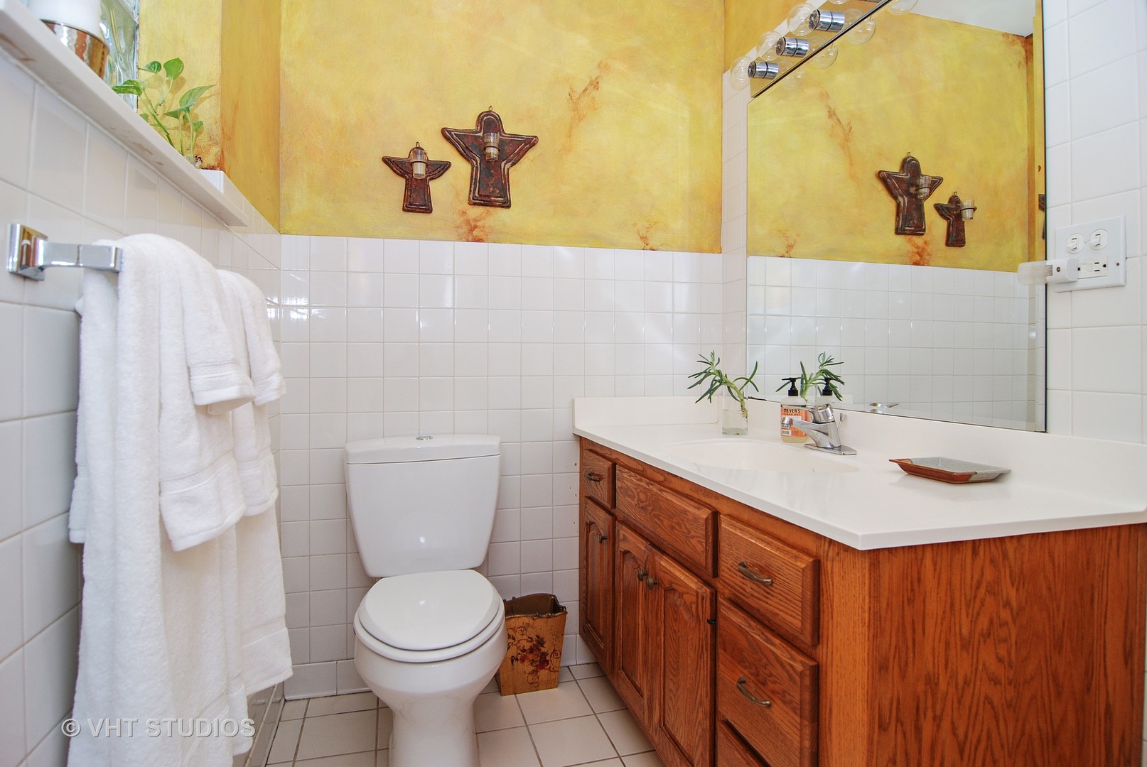 141 Barrypoint Road Riverside, IL 60546 - Photo 10 of 19 a bathroom with a sink mirror and toilet
