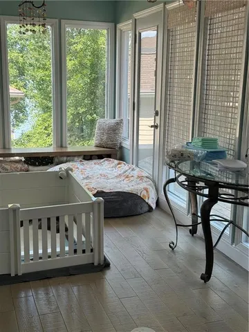 a view of a dining room with furniture window and outside view