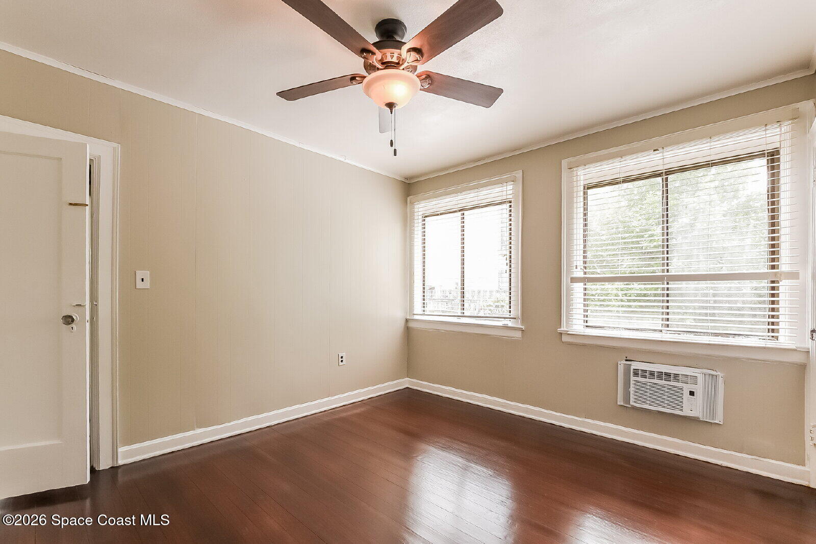 1428 Riverside Drive Titusville, FL 32780 - Photo 11 of 17 a view of an empty room with a window