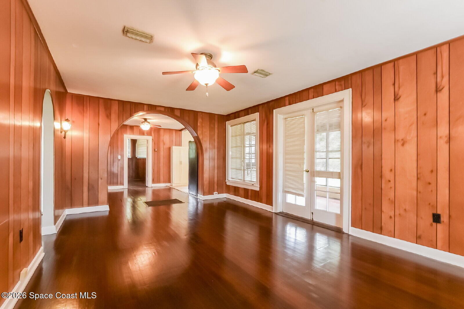 1428 Riverside Drive Titusville, FL 32780 - Photo 3 of 17 a view of an entryway with wooden floor