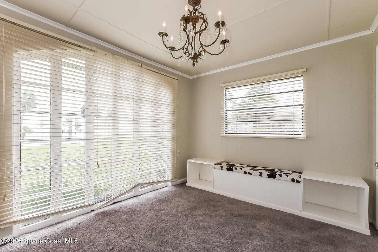1428 Riverside Drive Titusville, FL 32780 - Photo 8 of 17 a view of a livingroom with a window