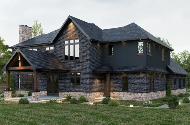 a front view of a house with a yard table and chairs