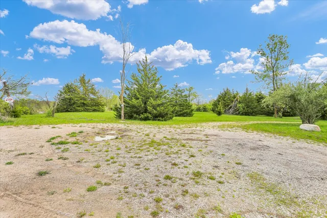 a view of a house with a big yard