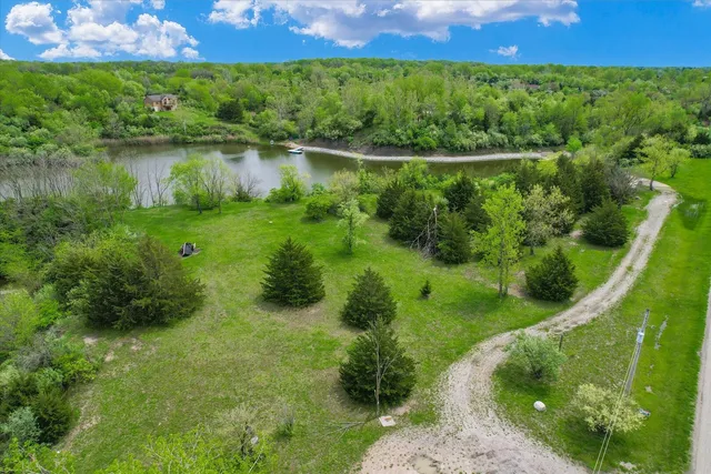 a view of a garden with a lake