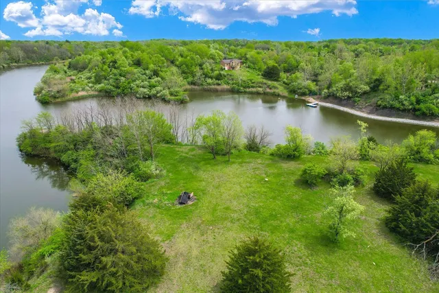 a view of a garden with a lake