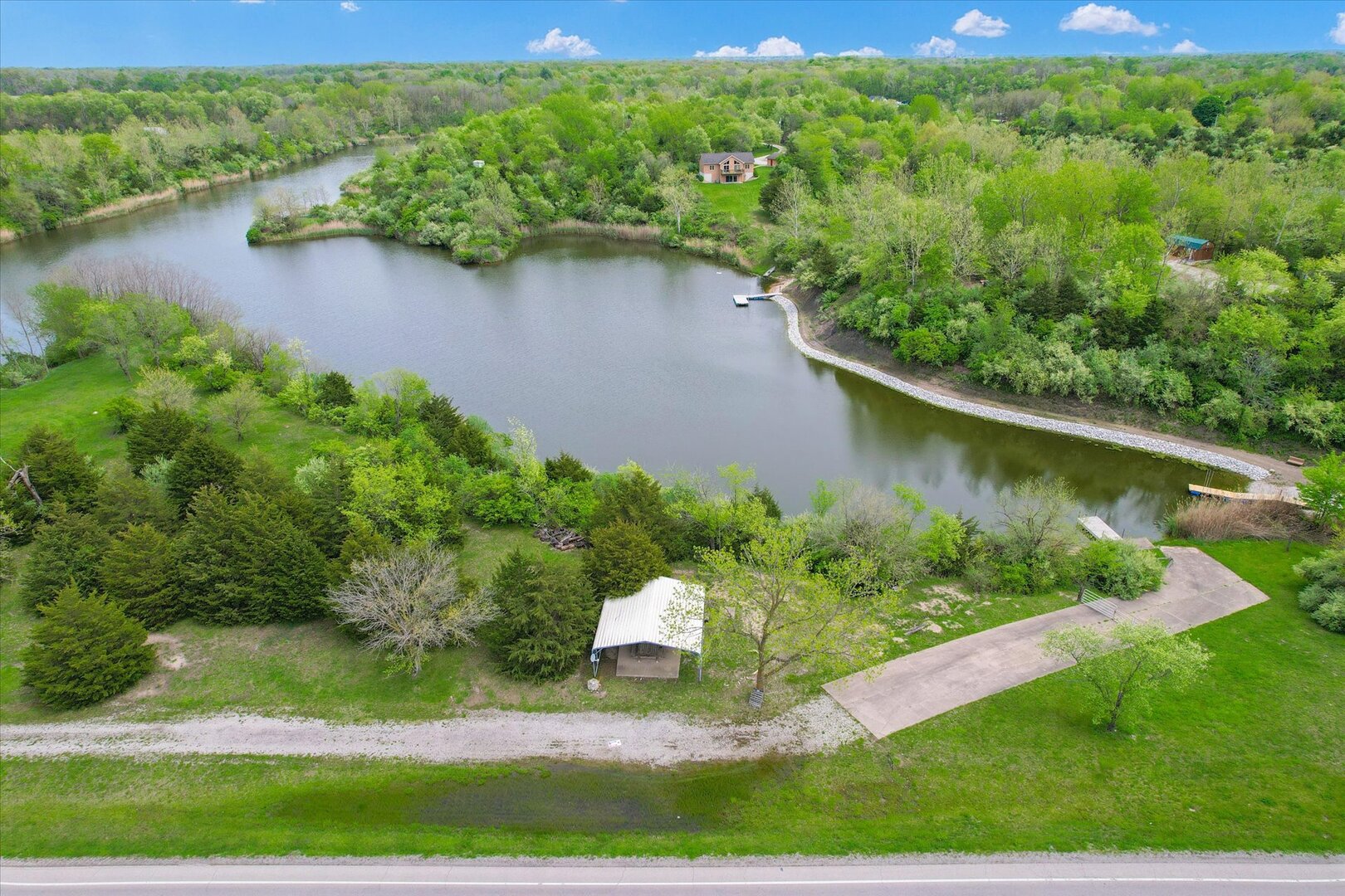 Dor1701 B Henning Road Danville, IL 61834 - Photo 35 of 40 a view of a lake with a yard