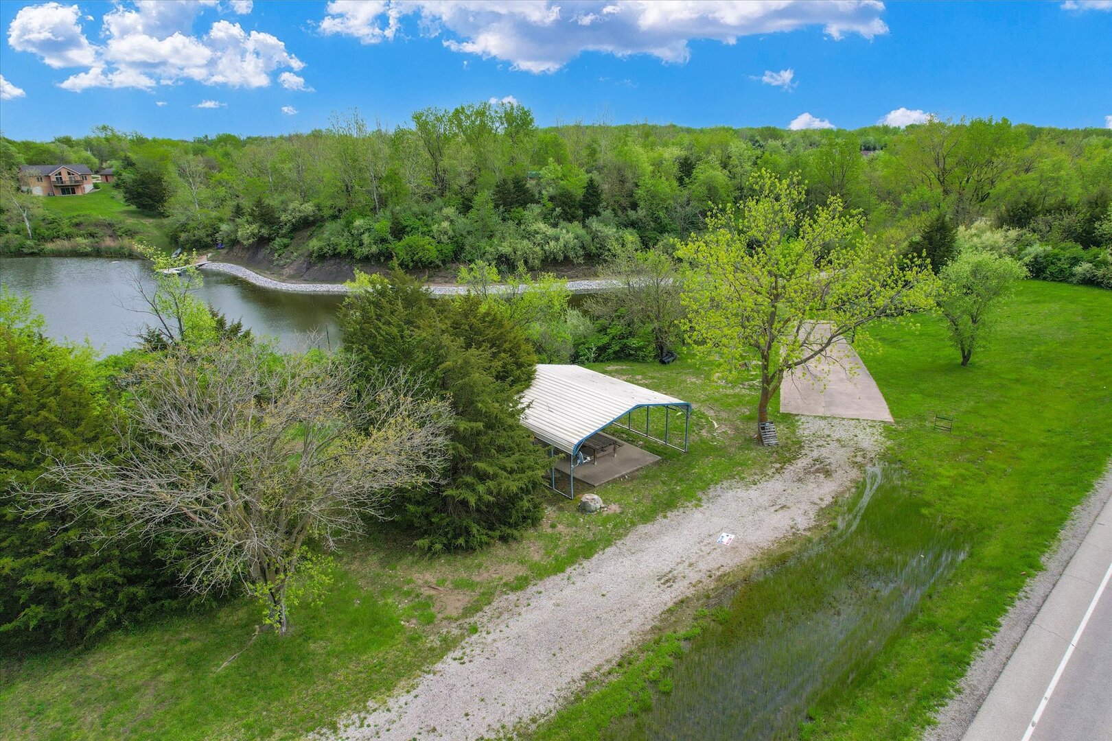 Dor1701 B Henning Road Danville, IL 61834 - Photo 36 of 40 an aerial view of a house with outdoor space and a lake view