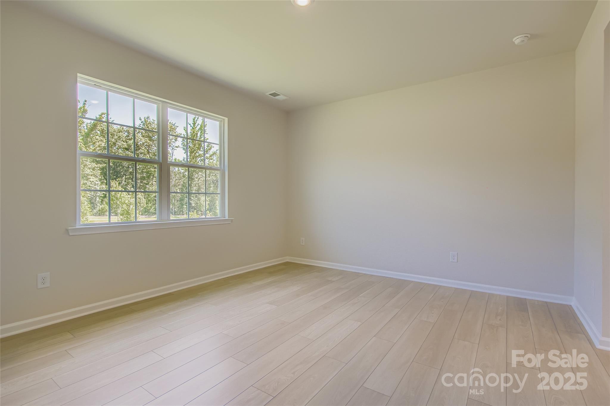 2844 Morning Song Way Lancaster, SC 29720 - Photo 5 of 16 an empty room with a window