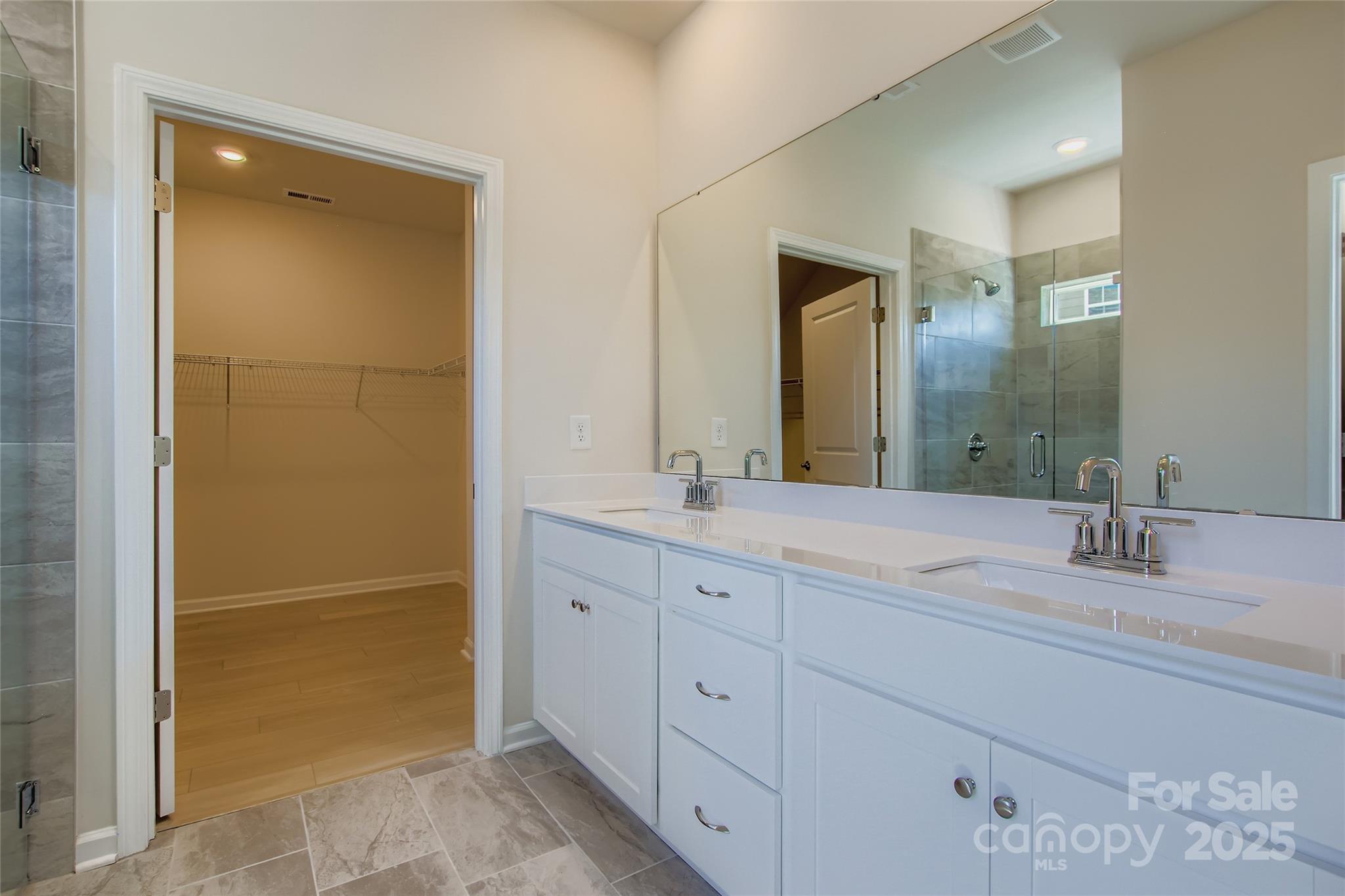 2844 Morning Song Way Lancaster, SC 29720 - Photo 6 of 16 a bathroom with a granite countertop sink mirror and a