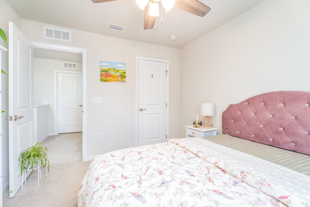 1207 Watson Lane Grottoes, VA 24441 - Photo 74 of 75 a bedroom with a bed and a couch