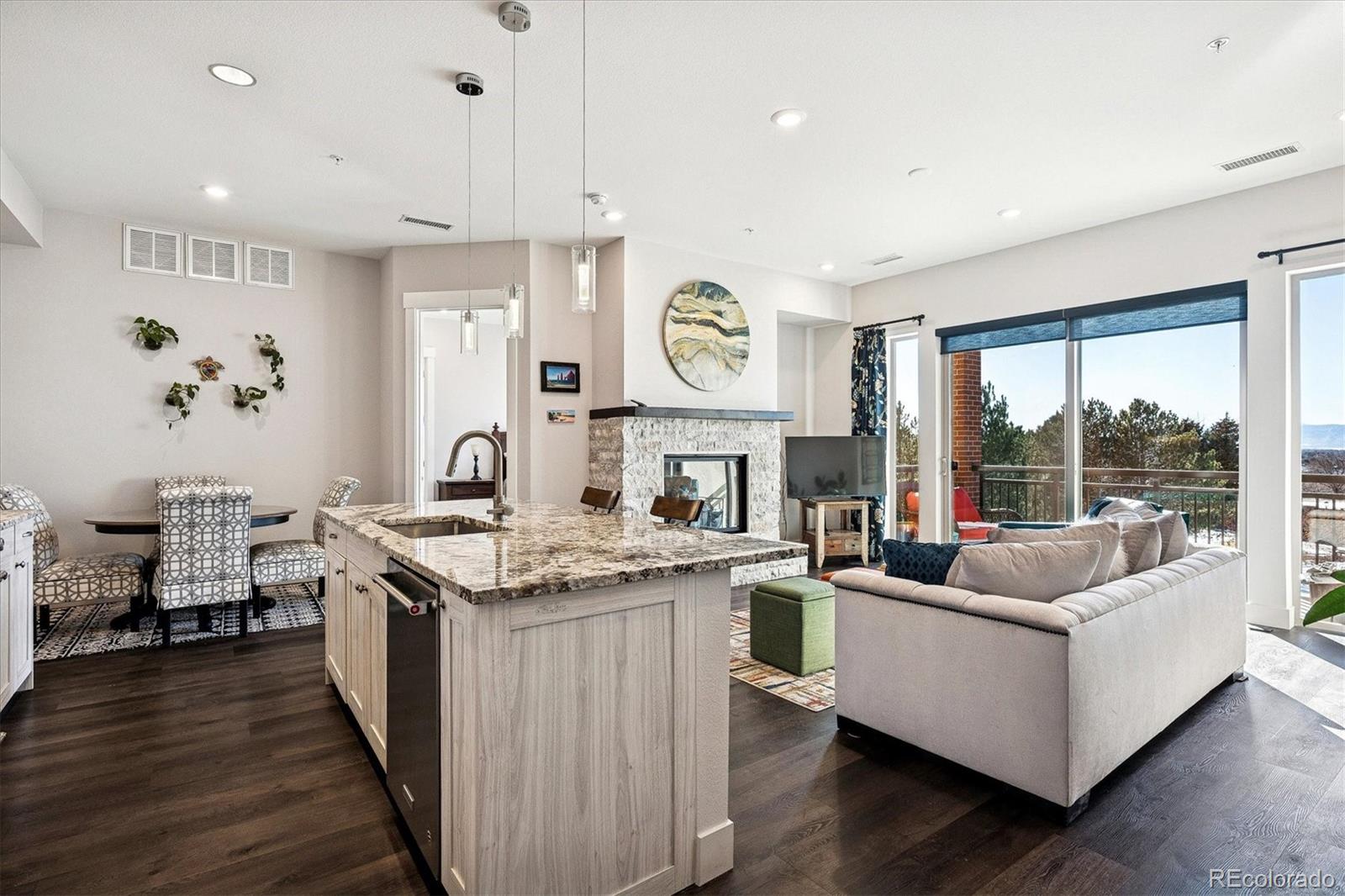 a open kitchen with stainless steel appliances granite countertop a stove and cabinets