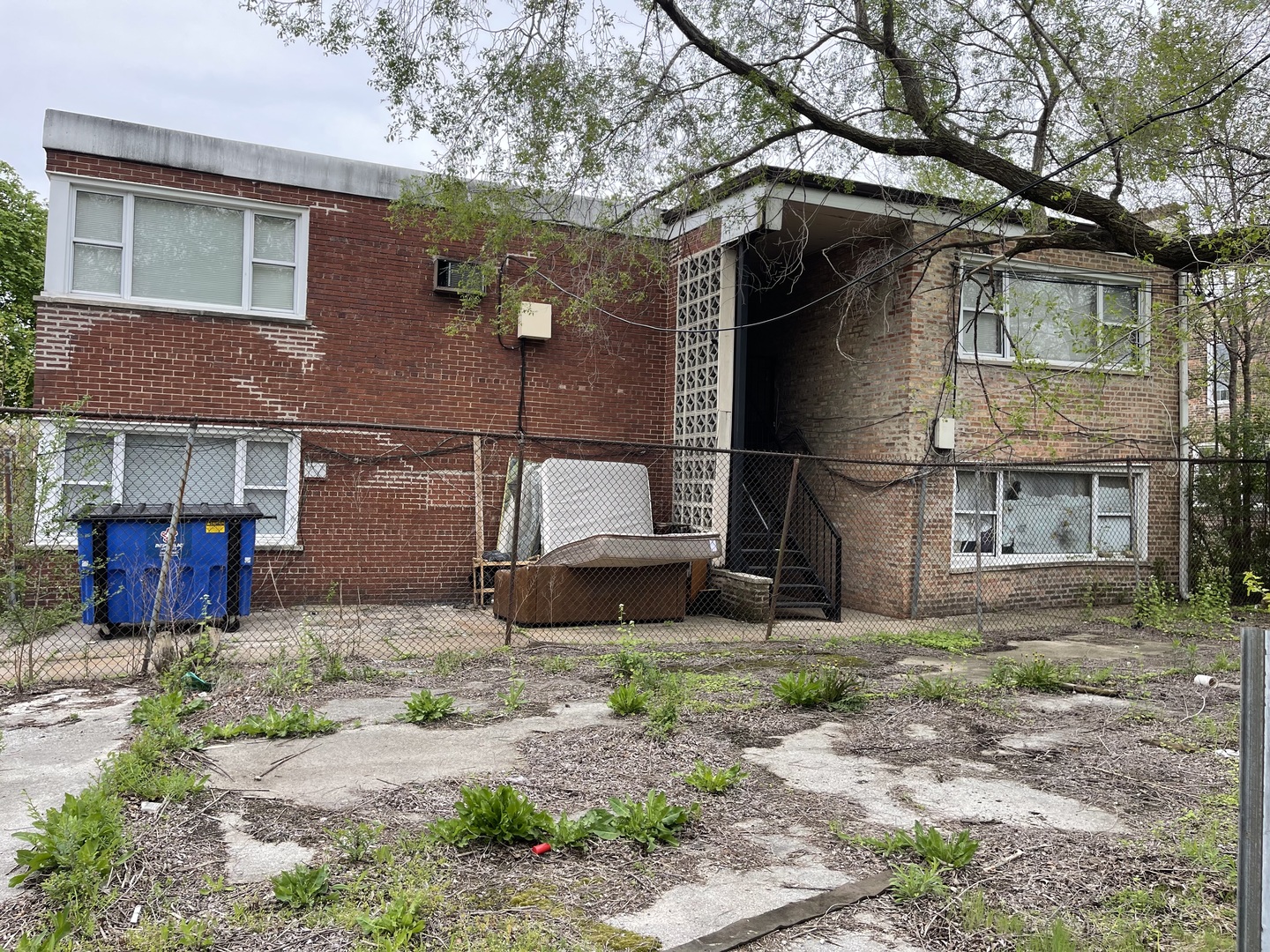 7700 South Normal Avenue Chicago, IL 60620 - Photo 6 of 7 a front view of a house with garden