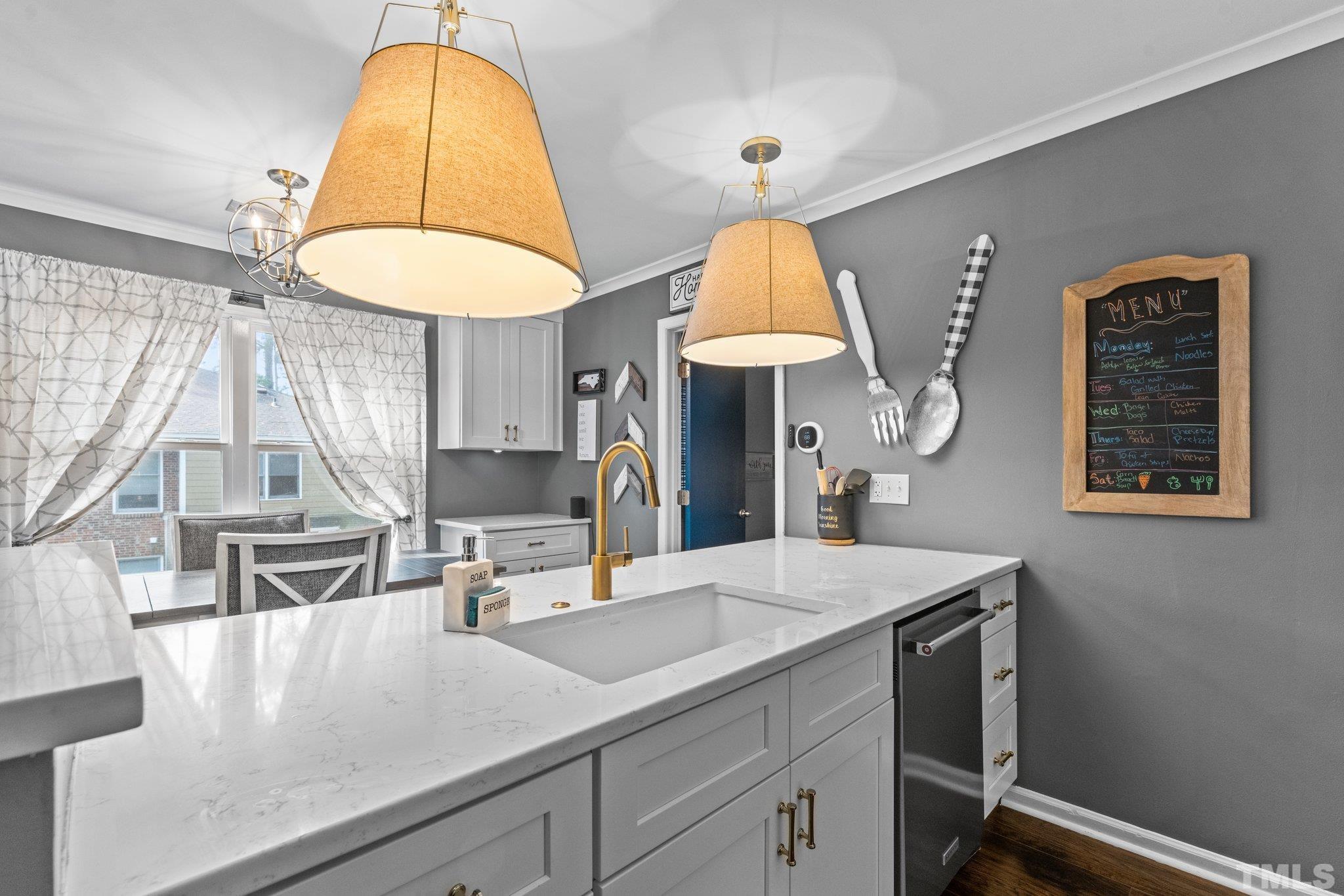 3231 Mill Run, Unit 3231 Raleigh, NC 27612 - Photo 16 of 28 a view of kitchen with sink and window