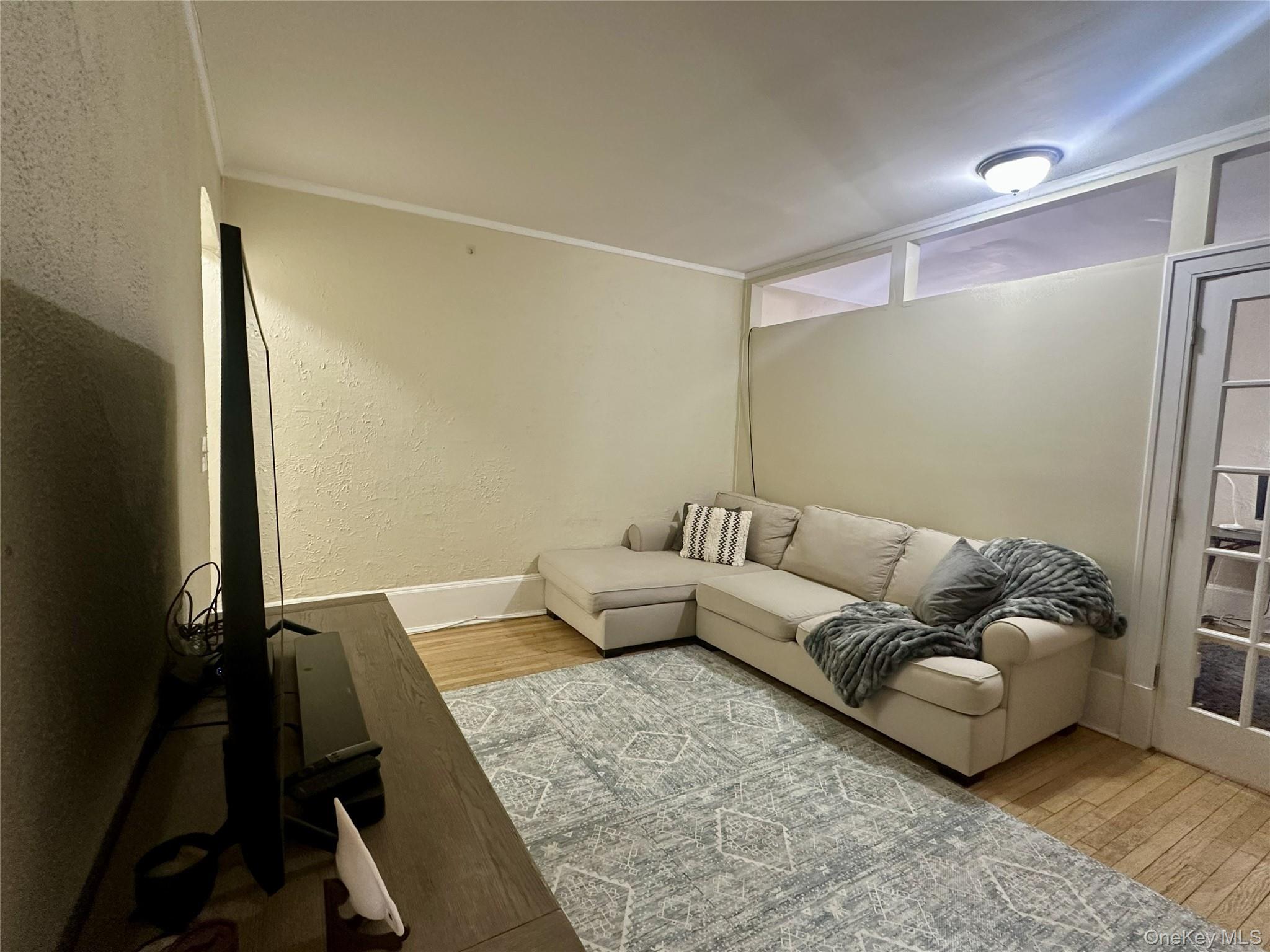 808 Bronx River Road, Unit 4E Bronxville, NY 10708 - Photo 7 of 19 Oversized Living Room (20' X 15") has been divided into 2 rooms. Hardwood Floors. Hall Closet.